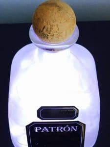 Patron tequila bottle fairy light side