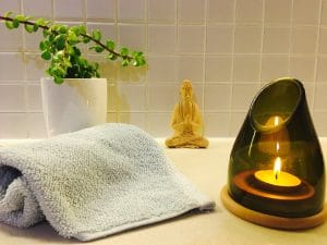 Wine Bottle and Timber Base Green Lantern with Buda, Towel and Plant